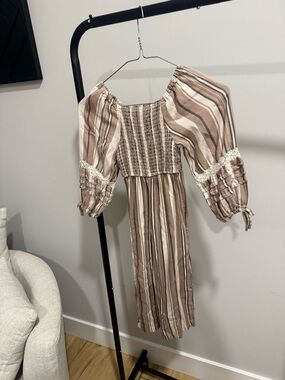 Jessica Simpson Taupe and Cream Striped One-Shoulder jumpsuit